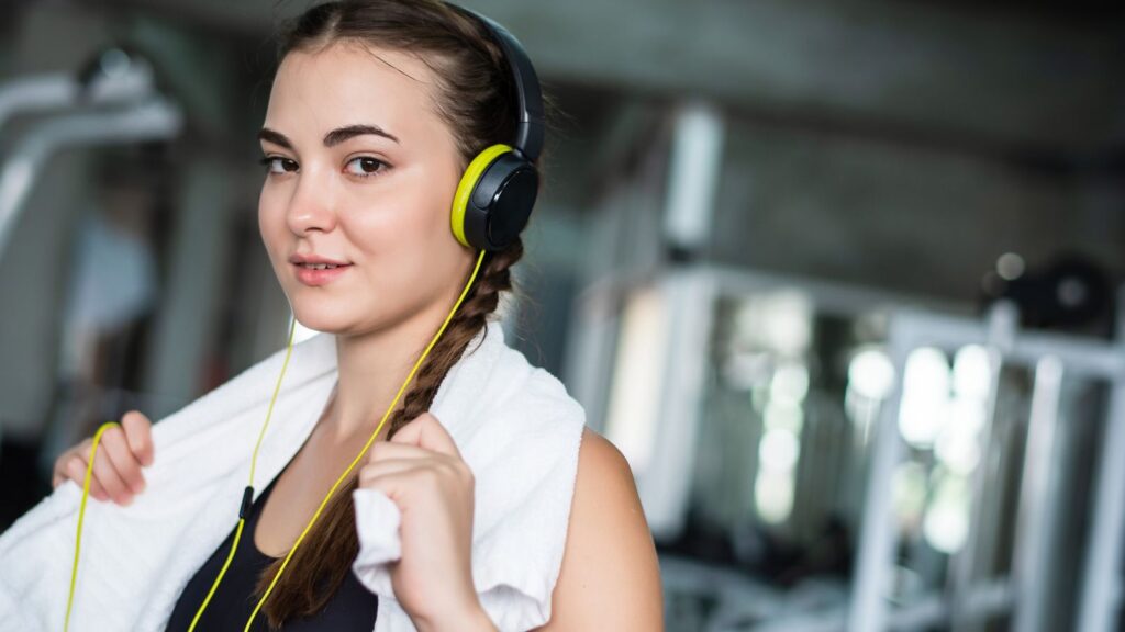 woman gym exercise towel music